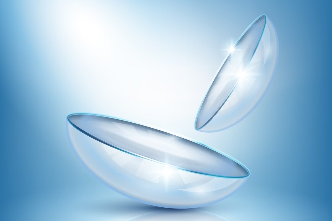 Realistic glossy eye lenses with reflection, composition on blue background with illumination vector illustration